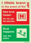 I tilfelle brann ikke bruk heisen - skilt med tospråklig tekst (norsk/ engelsk)